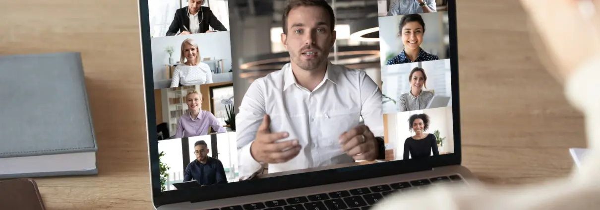 Employee in online meeting with colleagues